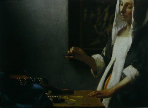Woman holding a balance (detail) Vermeer
