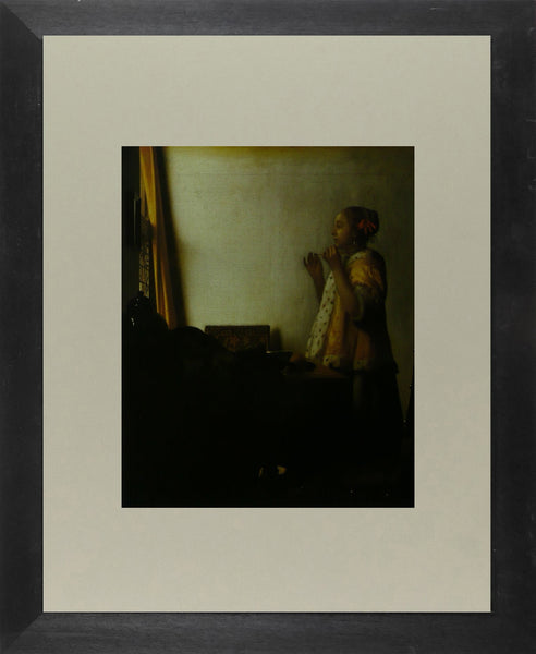 Woman with a pearl necklace Vermeer