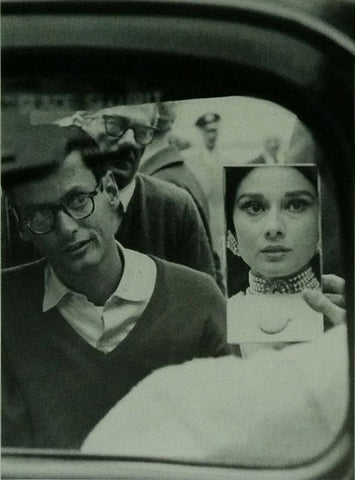Audrey Hepburn looking in the mirror with Richard Avedon 1959