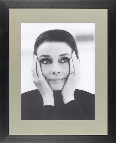 Audrey Hepburn with head in hands black & white