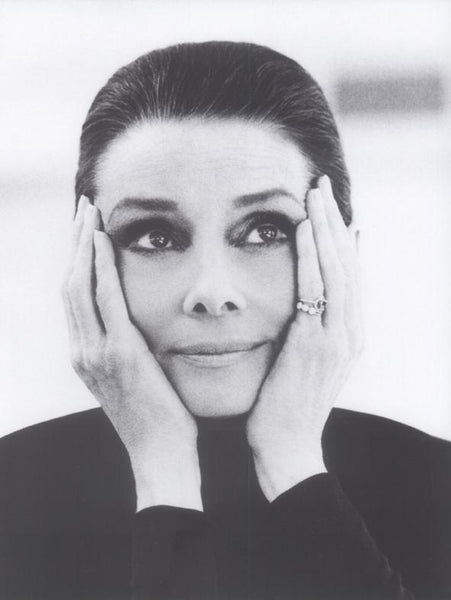 Audrey Hepburn with head in hands black & white