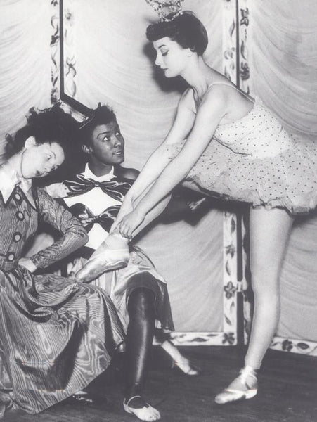 Audrey Hepburn in ballerina costume with 2 other dancers black & white