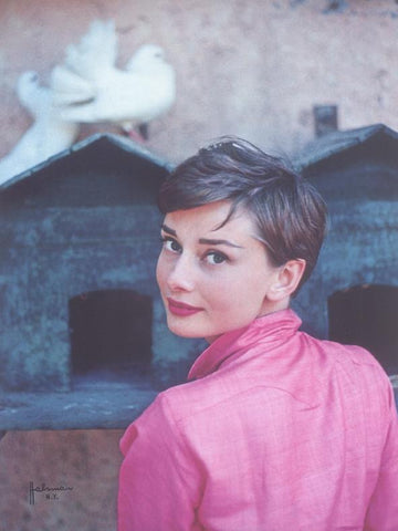 Audrey Hepburn in pink blouse