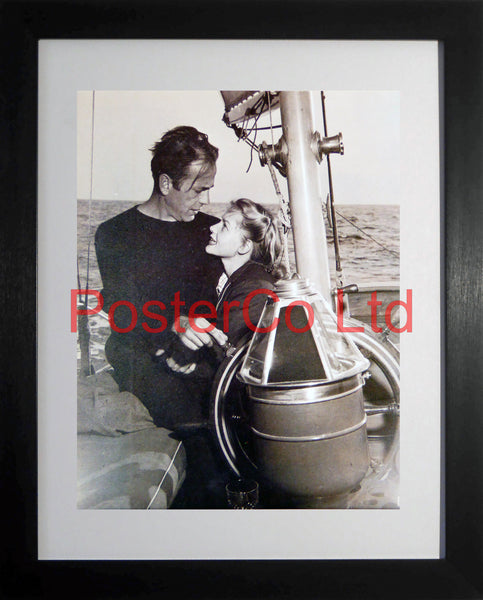 Humphrey Bogart and Lauren Bacall sailing  - Framed picture 16"H x 12"W