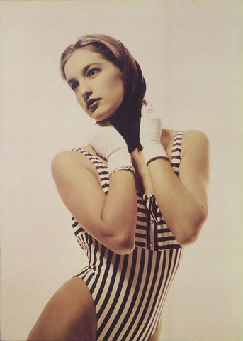Woman in a striped swimsuit 