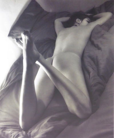 Back view of girl reclinin on a bed ( black & white) (Glamour Shot)